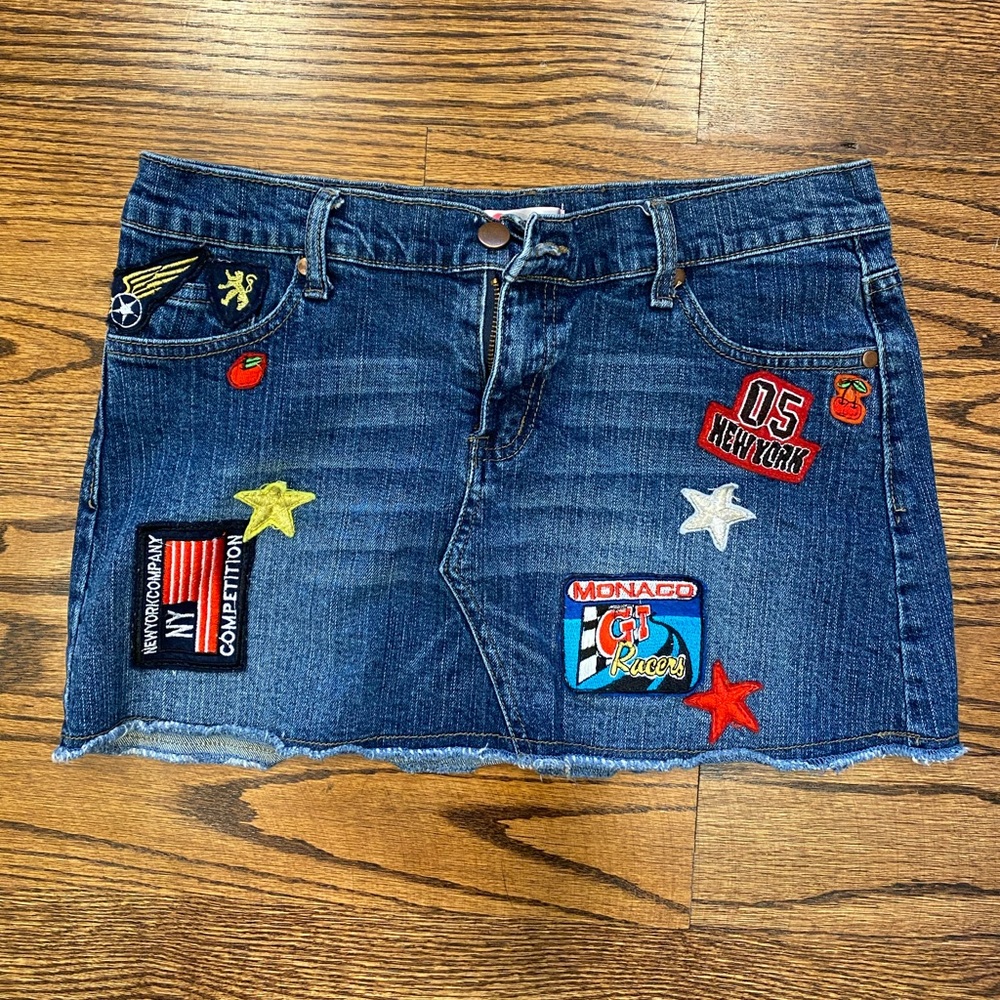 mini demon skirt with patches in size small!!